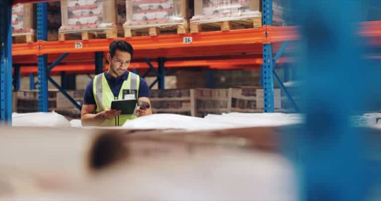 Logistics, man and tablet in warehouse with scanning, stock and price for safety in supply chain or