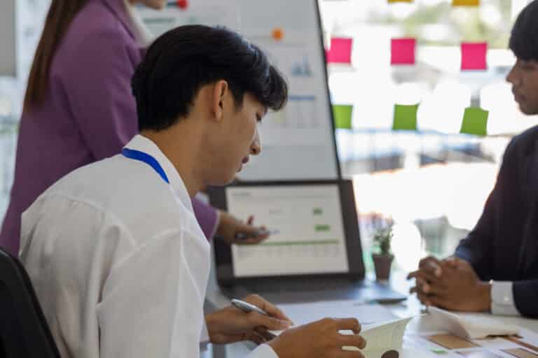 entrepreneurs brainstorm together to develop new products in a conference room, businesspeople share knowledge on marketing strategies and finance4s with each other, accountant, businessman