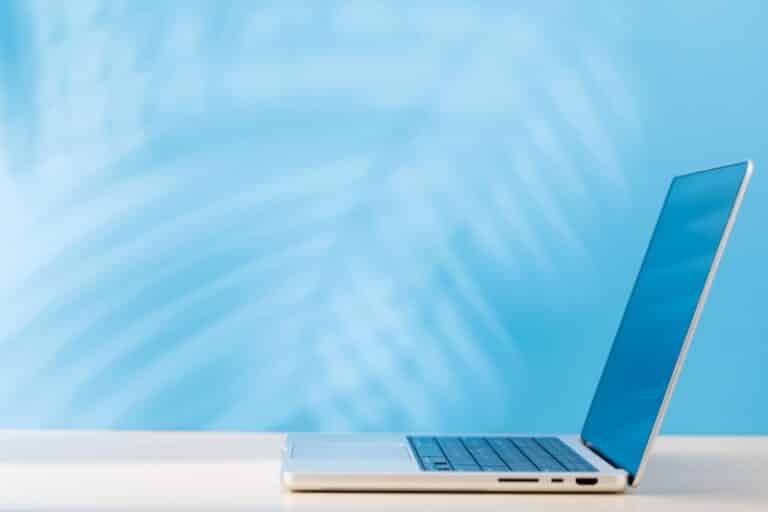Laptop with a blank screen placed on a table